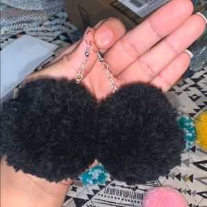 black pom pom earrings